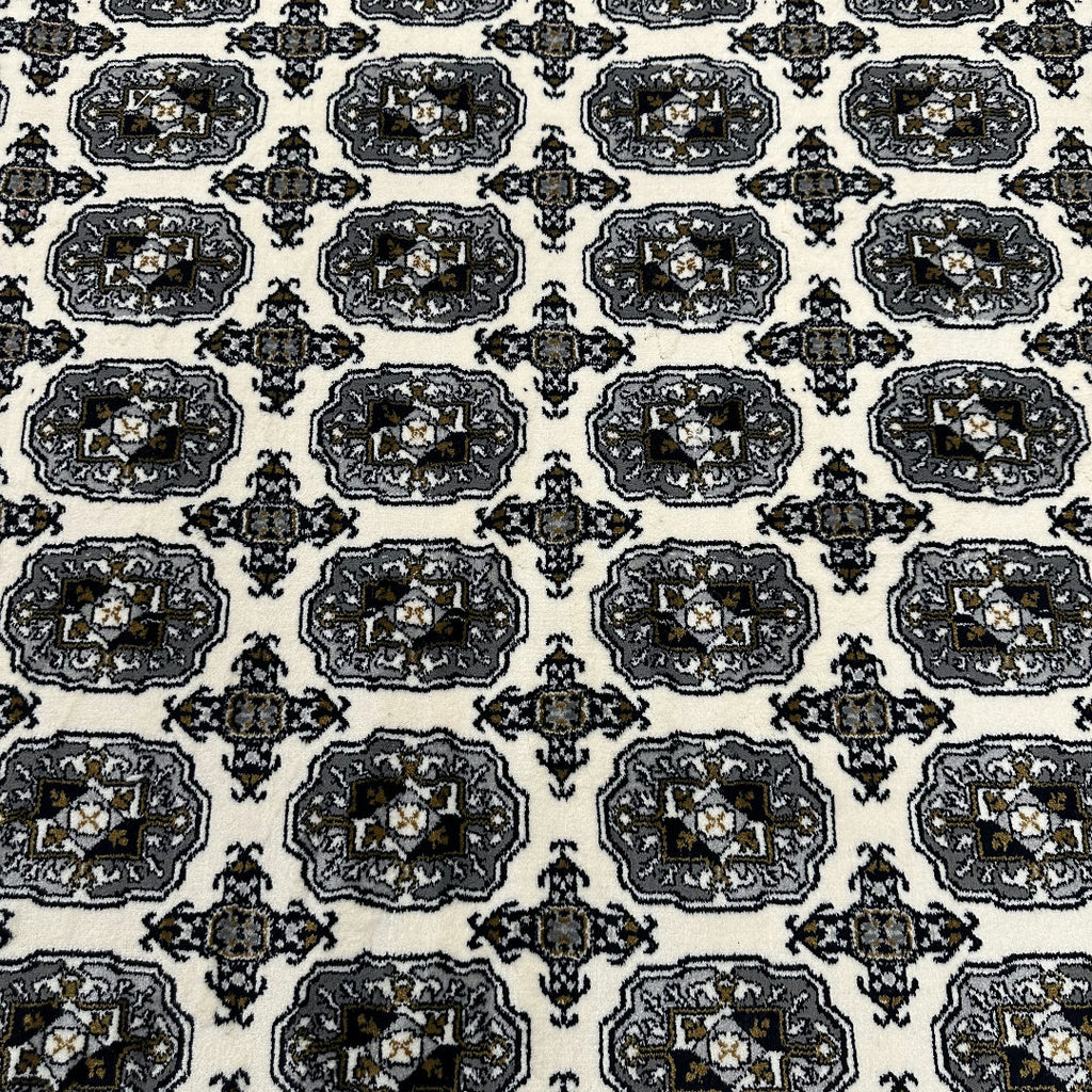 Square cream and grey Bokhara rug detail