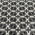 Square cream and grey Bokhara rug detail