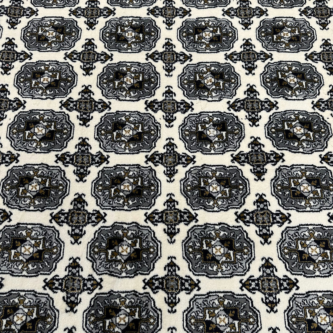 Square cream and grey Bokhara rug detail