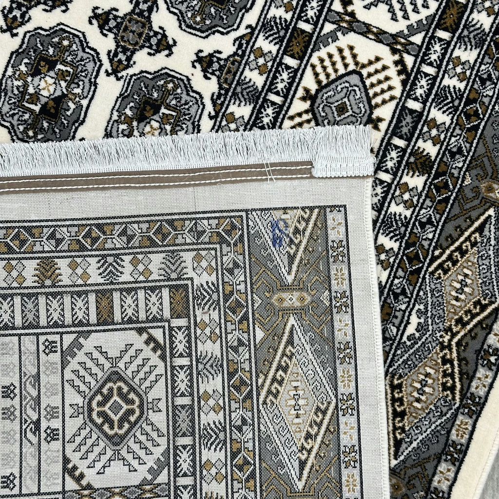 Square cream and grey Bokhara rug detail