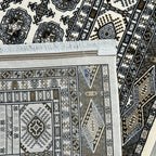 Square cream and grey Bokhara rug detail