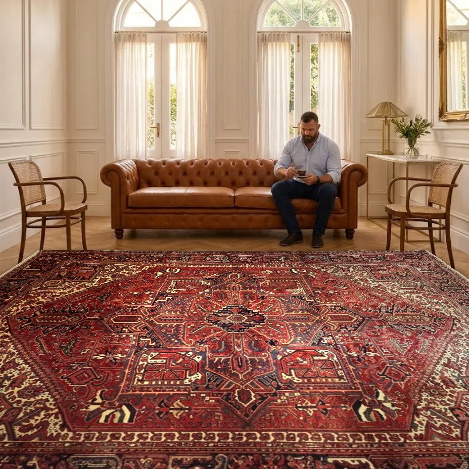 Room view: 391 x 310 cm Hand Knotted Antique Heriz Persian – Wool Rug shown in an elegant salon