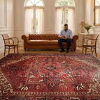 Room view: 391 x 310 cm Hand Knotted Antique Heriz Persian – Wool Rug shown in an elegant salon
