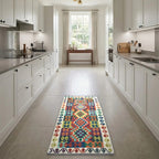 Room view: the rug on the floor of a furnished room, shown at its real size