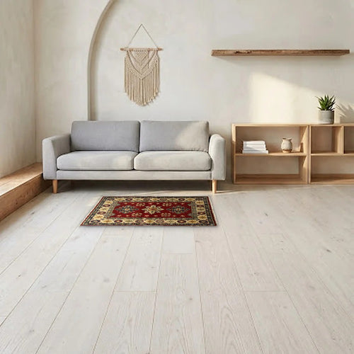 Room view: the rug on the floor of a furnished room, shown at its real size