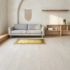 Room view: the rug on the floor of a furnished room, shown at its real size