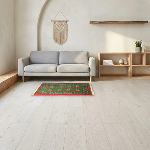 Room view: the rug on the floor of a furnished room, shown at its real size