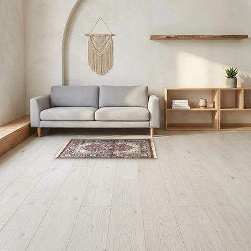 Room view: the rug on the floor of a furnished room, shown at its real size