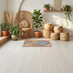 Room view: the rug on the floor of a furnished room, shown at its real size