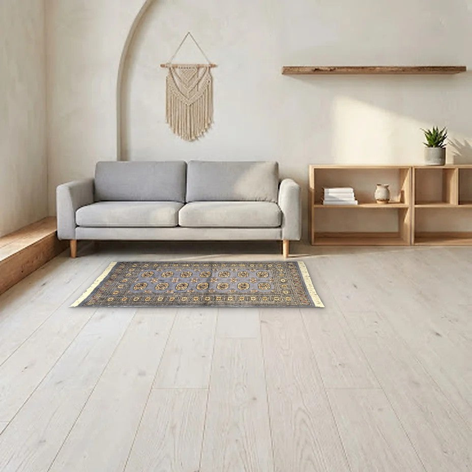 Room view: the rug on the floor of a furnished room, shown at its real size