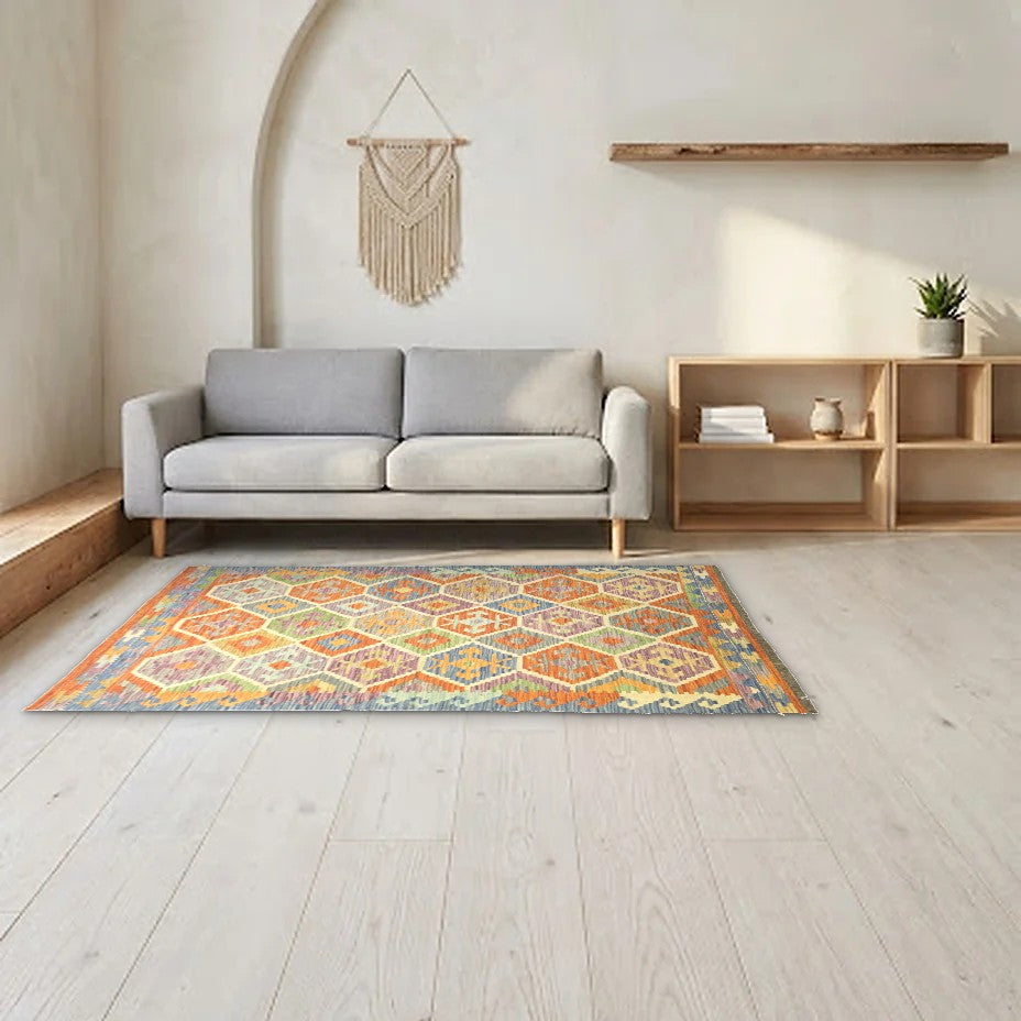 Room view: the rug on the floor of a furnished room, shown at its real size