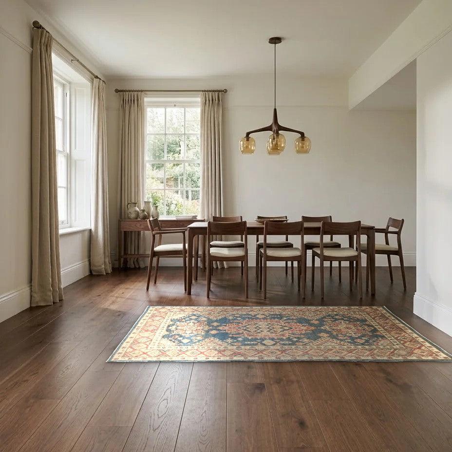 Room view: the rug on the floor of a furnished room, shown at its real size