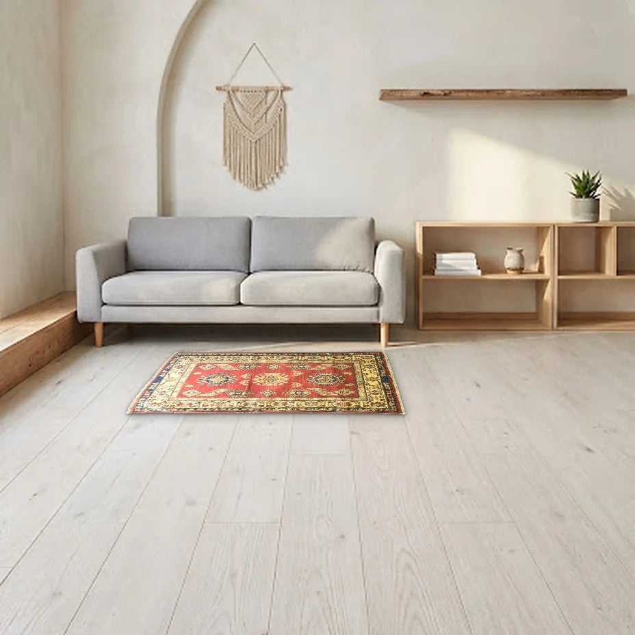 Room view: the rug on the floor of a furnished room, shown at its real size
