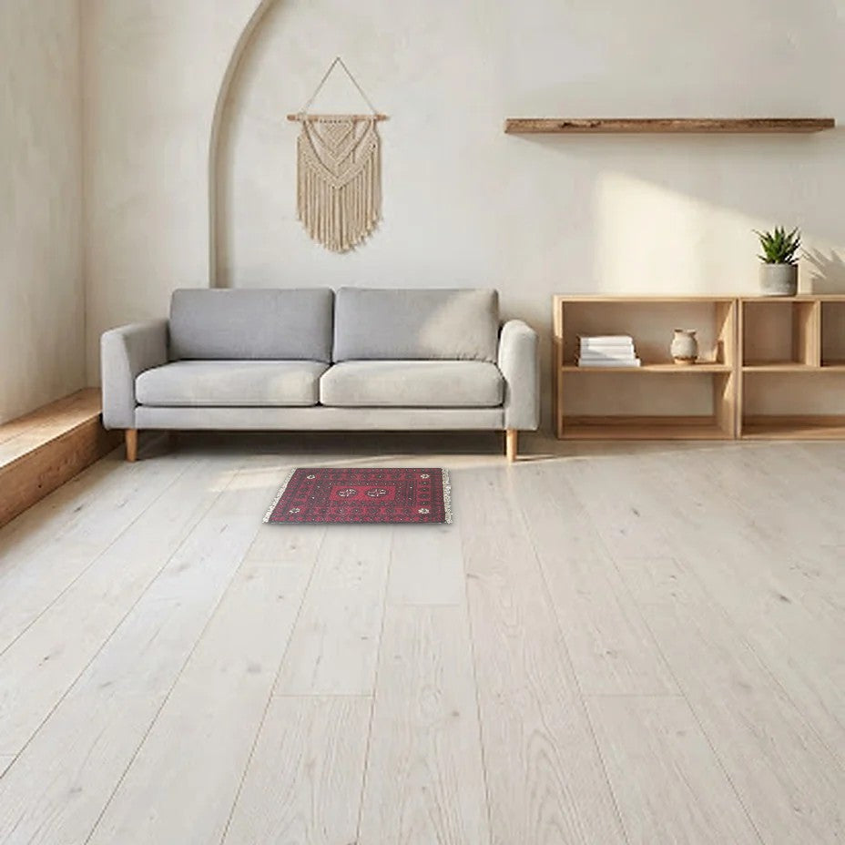 Room view: the rug on the floor of a furnished room, shown at its real size