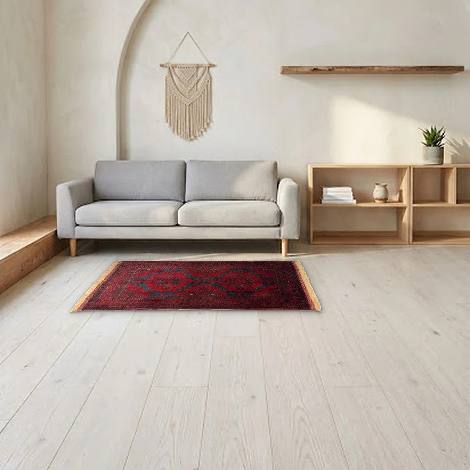 Room view: the rug on the floor of a furnished room, shown at its real size