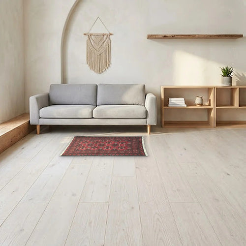 Room view: the rug on the floor of a furnished room, shown at its real size