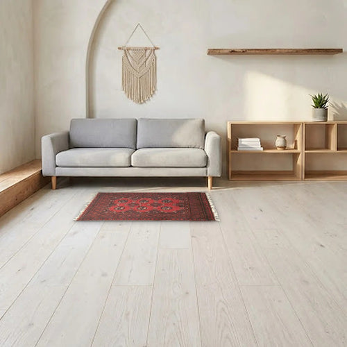 Room view: the rug on the floor of a furnished room, shown at its real size