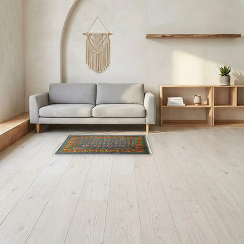Room view: the rug on the floor of a furnished room, shown at its real size