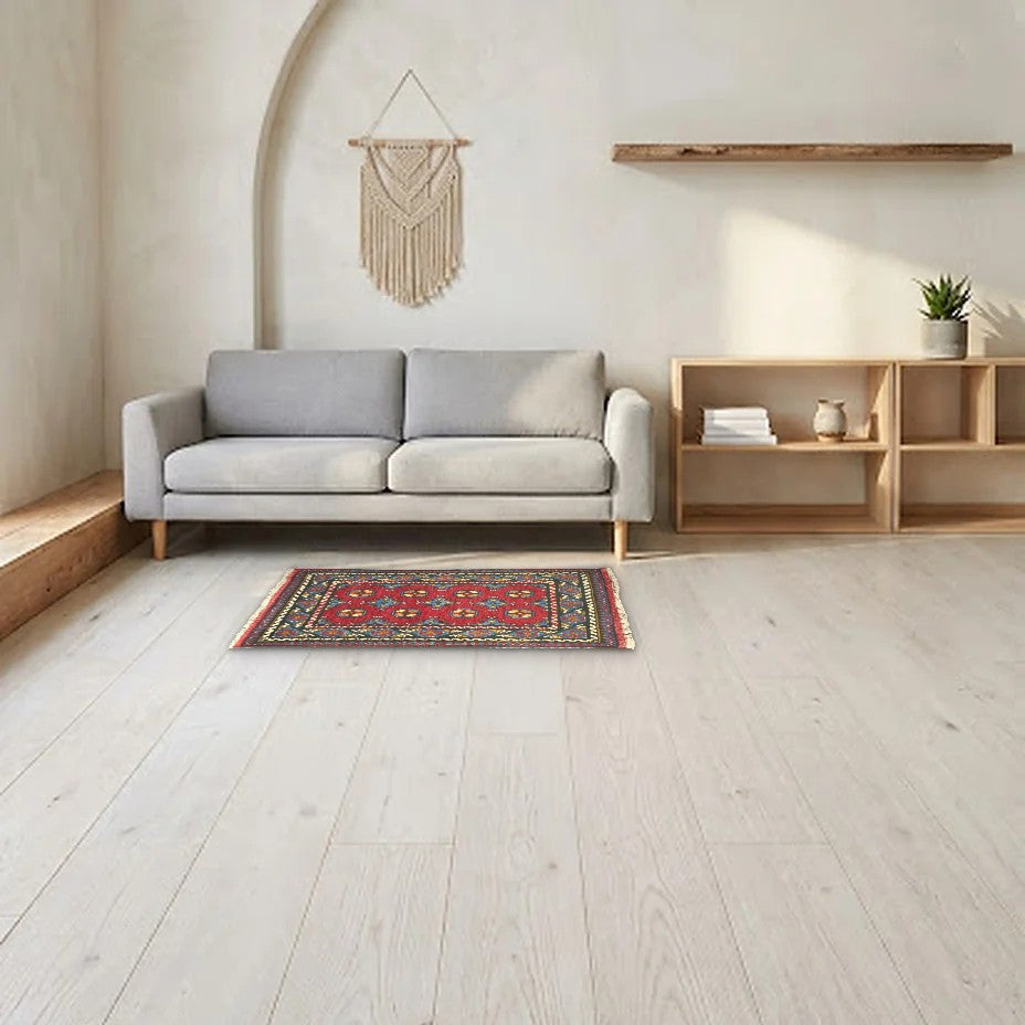 Room view: the rug on the floor of a furnished room, shown at its real size
