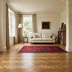 Room view: the rug on the floor of a furnished room, shown at its real size