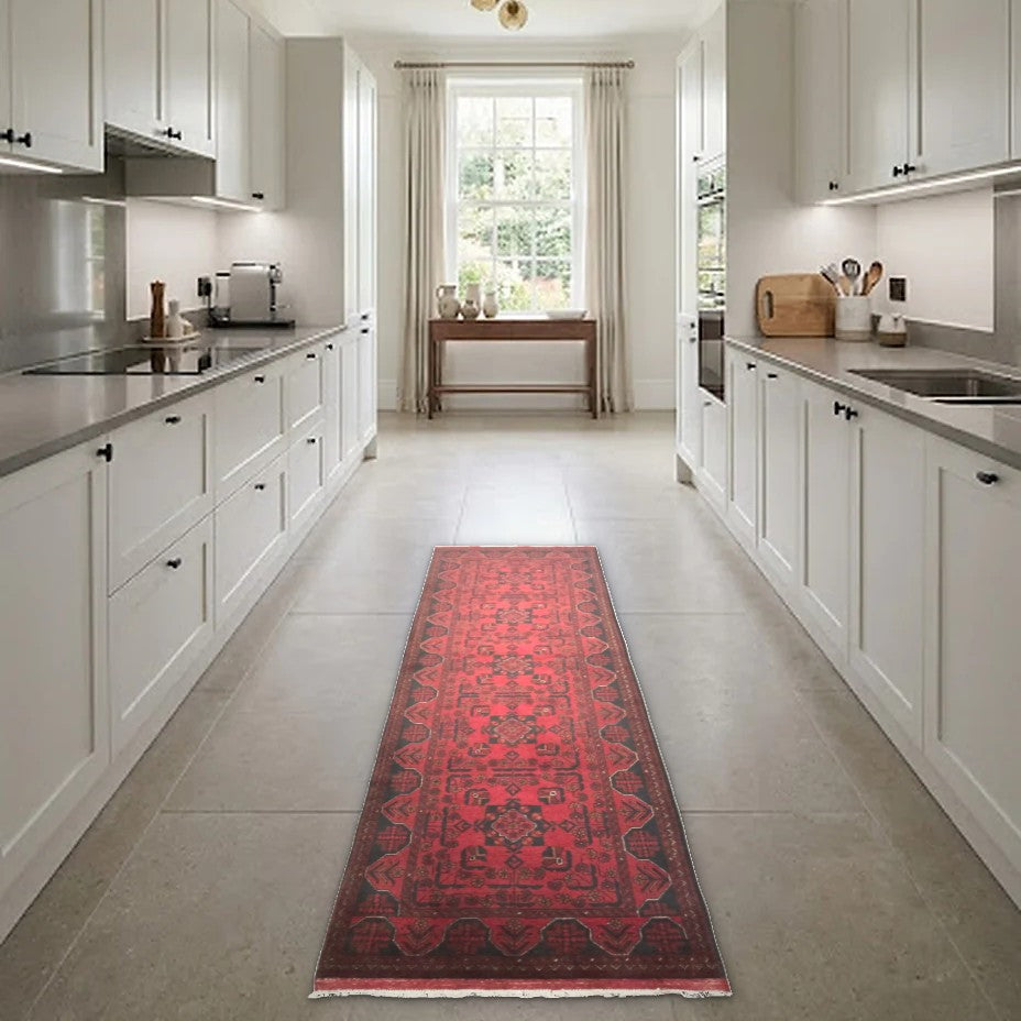 Room view: the rug on the floor of a furnished room, shown at its real size