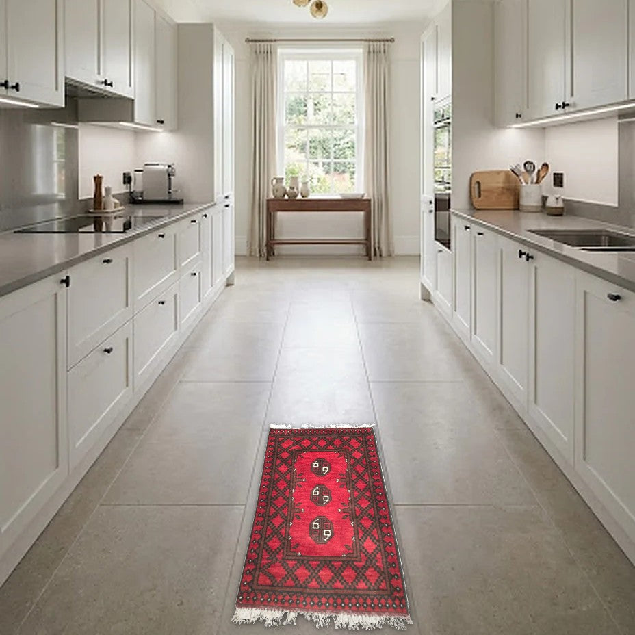 Room view: the rug on the floor of a furnished room, shown at its real size