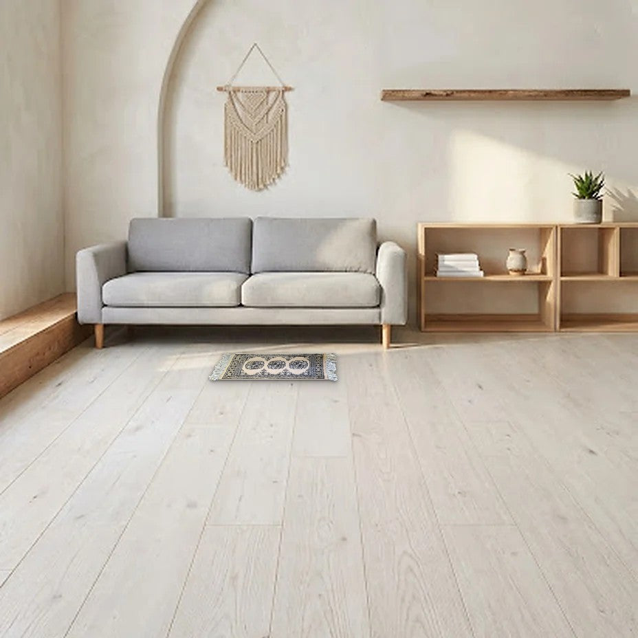 Room view: the rug on the floor of a furnished room, shown at its real size