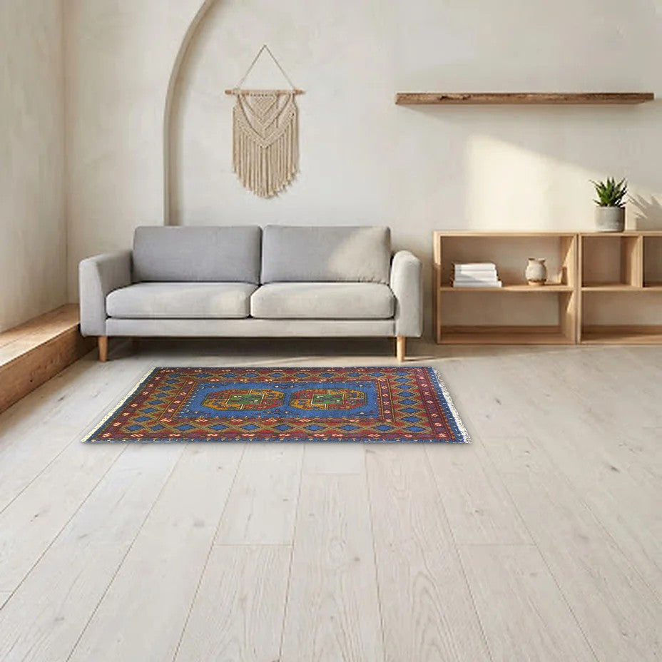 Room view: the rug on the floor of a furnished room, shown at its real size