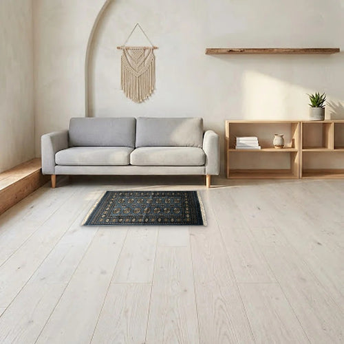 Room view: the rug on the floor of a furnished room, shown at its real size