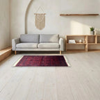 Room view: the rug on the floor of a furnished room, shown at its real size