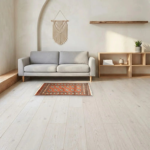 Room view: the rug on the floor of a furnished room, shown at its real size