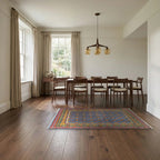 Room view: the rug on the floor of a furnished room, shown at its real size