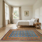 Room view: the rug on the floor of a furnished room, shown at its real size