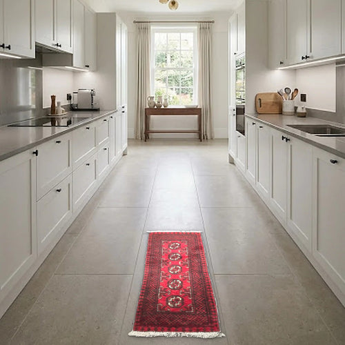 Room view: the rug on the floor of a furnished room, shown at its real size