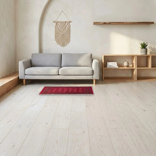 Room view: the rug on the floor of a furnished room, shown at its real size